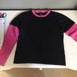 pink and black sweater